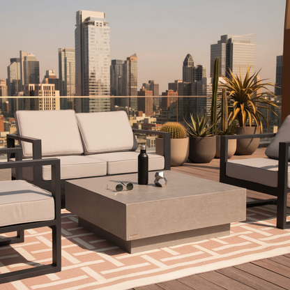Close-up of grey concrete table on rooftop terrace